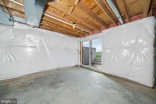 a view of an house with backyard space and deck