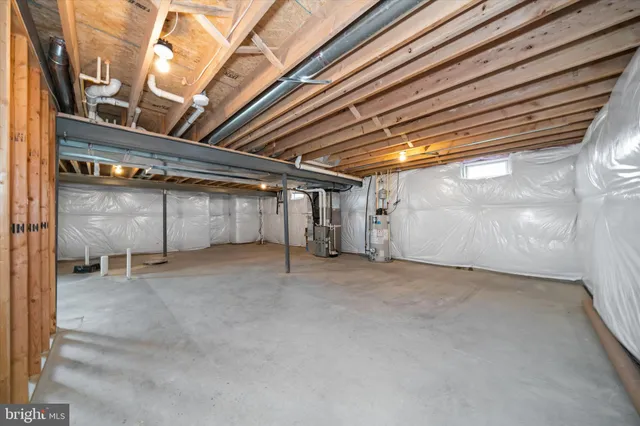 an aerial view of a chairs and table