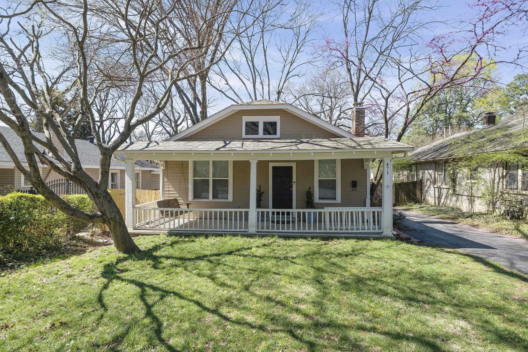 471 South Reese Street Memphis, TN 38111 - Photo 1 of 22 a front view of a house with a garden