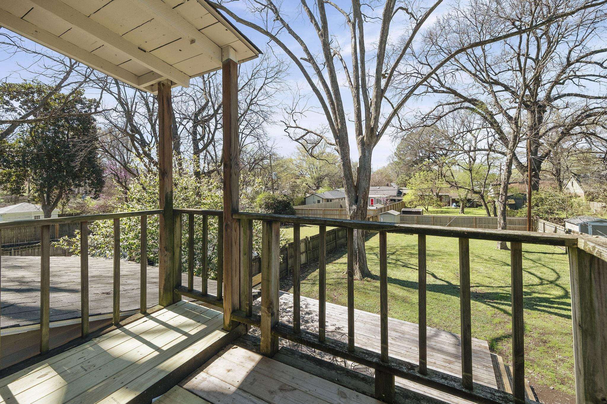 471 South Reese Street Memphis, TN 38111 - Photo 18 of 22 a view of balcony with wooden floor and fence