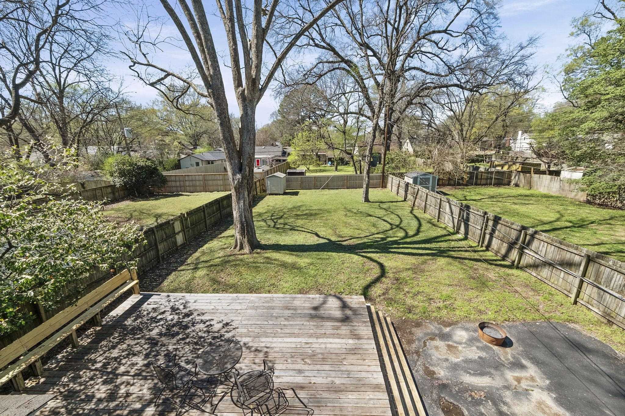 471 South Reese Street Memphis, TN 38111 - Photo 19 of 22 a view of a garden with a bench