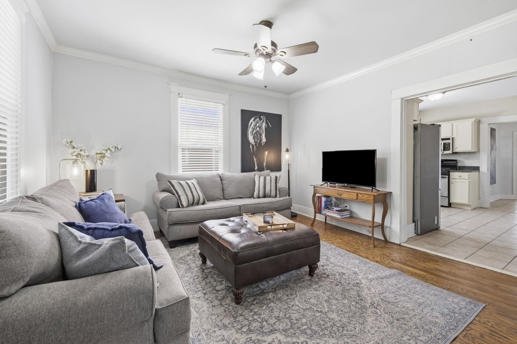 471 South Reese Street Memphis, TN 38111 - Photo 3 of 22 a living room with furniture and a flat screen tv