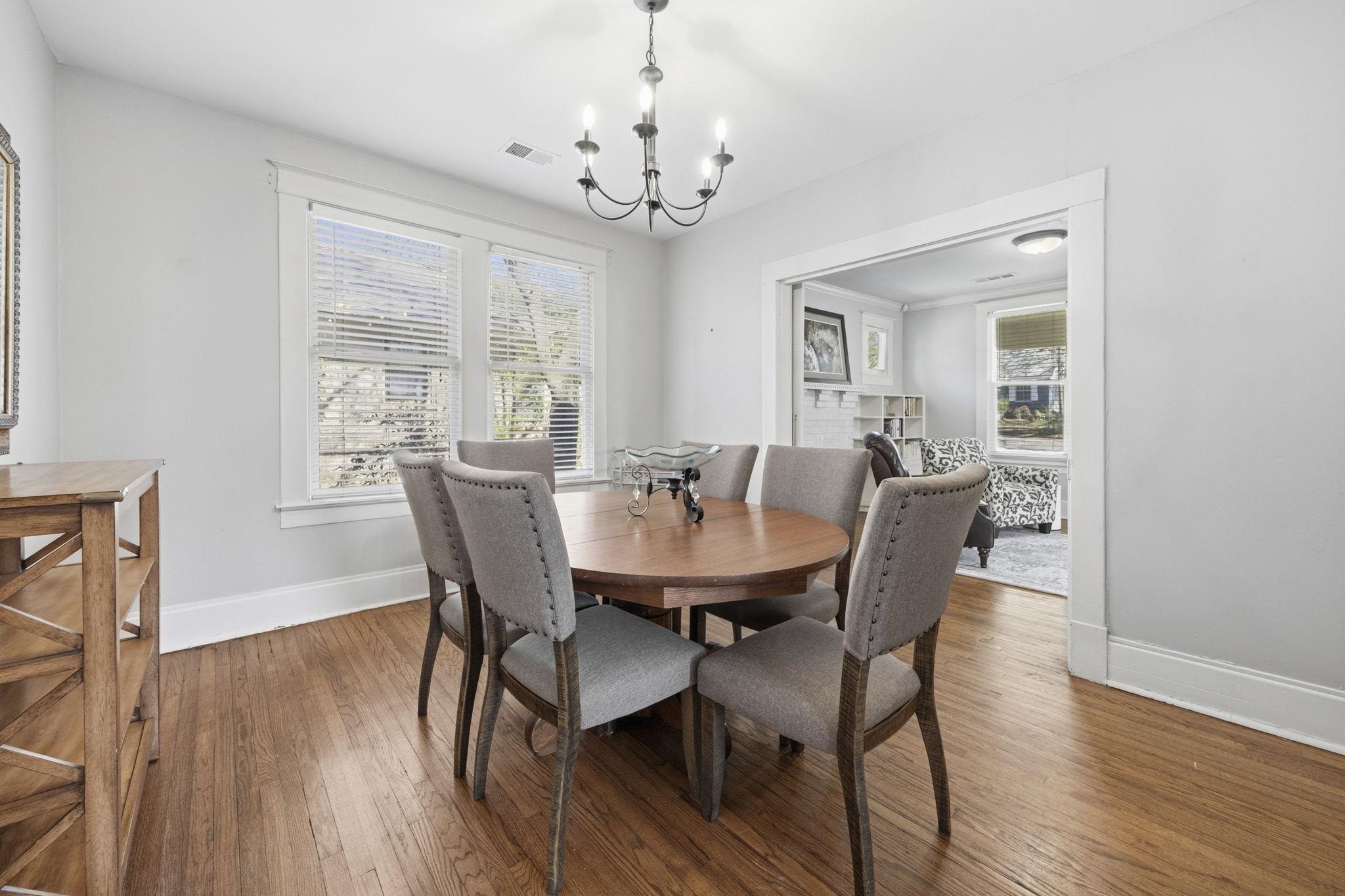 471 South Reese Street Memphis, TN 38111 - Photo 5 of 22 a view of a dining room with furniture window and wooden floor