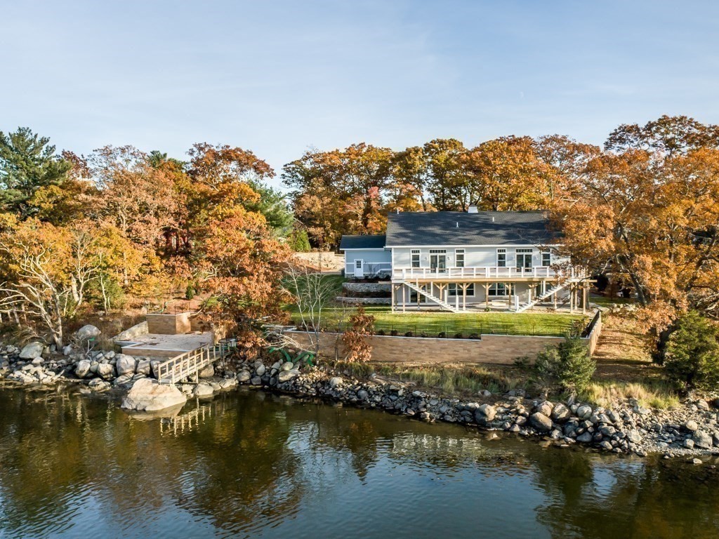 8 Stanwood Point, Unit A Gloucester, MA 01930 - Photo 18 of 21 an aerial view of a house with a lake view
