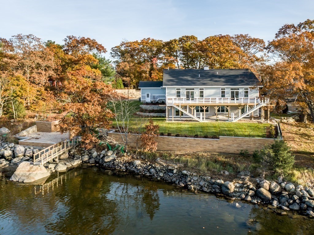 8 Stanwood Point, Unit A Gloucester, MA 01930 - Photo 3 of 21 a view of house with a lake view