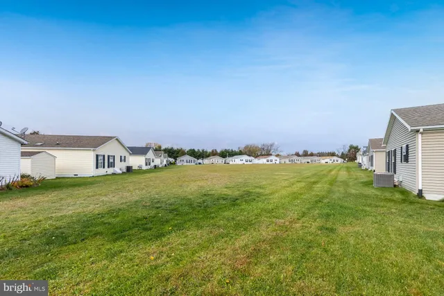 a view of a house with a big yard