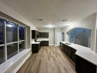 720 Fox Run Trail Saginaw, TX 76179 - Photo 5 of 17 a large kitchen with a large counter top appliances and cabinets
