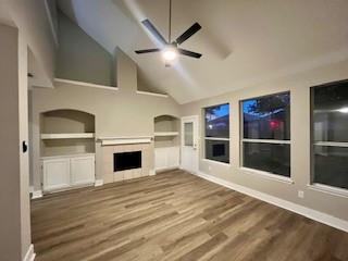720 Fox Run Trail Saginaw, TX 76179 - Photo 7 of 17 a view of a livingroom with a ceiling fan kitchen and flat screen tv