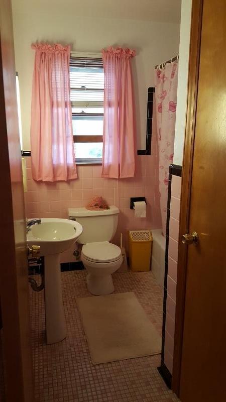 2713 Beech Mountain Road Ferrum, VA 24088 - Photo 14 of 24 a bathroom with a sink toilet and shower