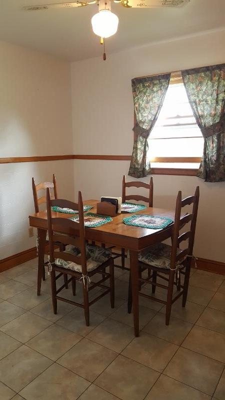 2713 Beech Mountain Road Ferrum, VA 24088 - Photo 8 of 24 a view of a dining room with furniture and window