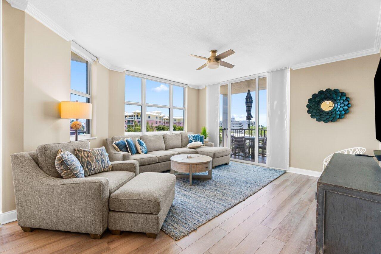 191 Southeast 20th Avenue, Unit 513 Deerfield Beach, FL 33441 - Photo 11 of 34 a living room with furniture and a large window