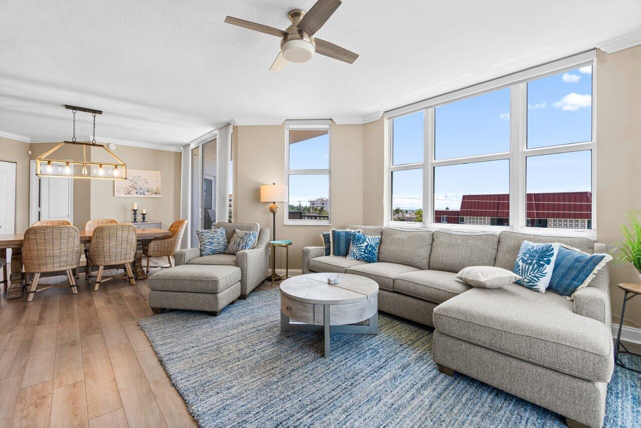 191 Southeast 20th Avenue, Unit 513 Deerfield Beach, FL 33441 - Photo 12 of 34 a living room with furniture and a large window