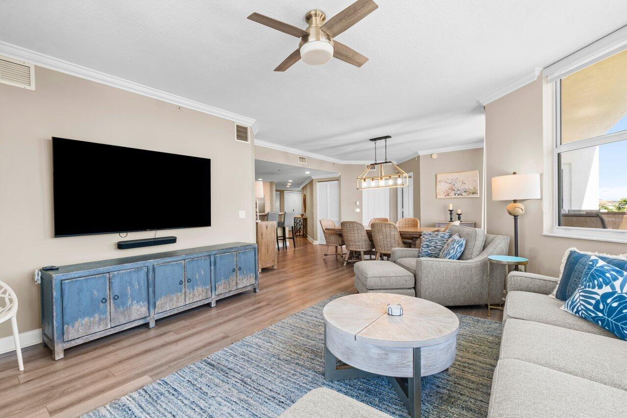 191 Southeast 20th Avenue, Unit 513 Deerfield Beach, FL 33441 - Photo 13 of 34 a living room with furniture and a flat screen tv