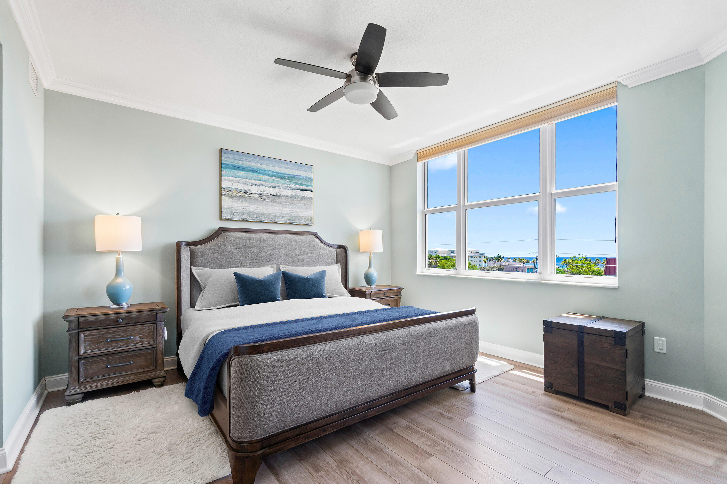 191 Southeast 20th Avenue, Unit 513 Deerfield Beach, FL 33441 - Photo 15 of 34 a bedroom with a bed a window and potted plant on the dresser