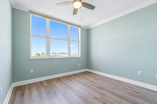 a balcony with furniture and city view