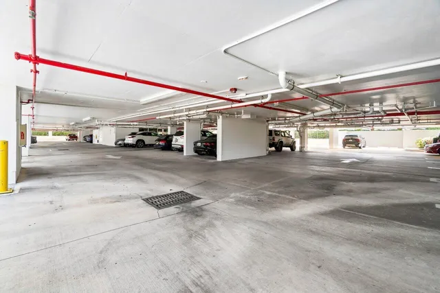 a view of a fireplace with two windows