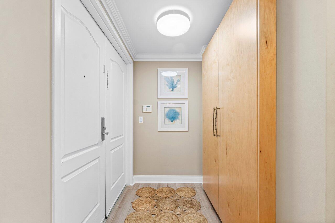 191 Southeast 20th Avenue, Unit 513 Deerfield Beach, FL 33441 - Photo 3 of 34 a view of room with window and hardwood floor