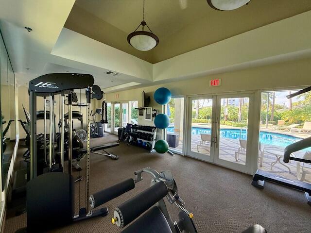 191 Southeast 20th Avenue, Unit 513 Deerfield Beach, FL 33441 - Photo 31 of 34 a view of a room with gym equipment