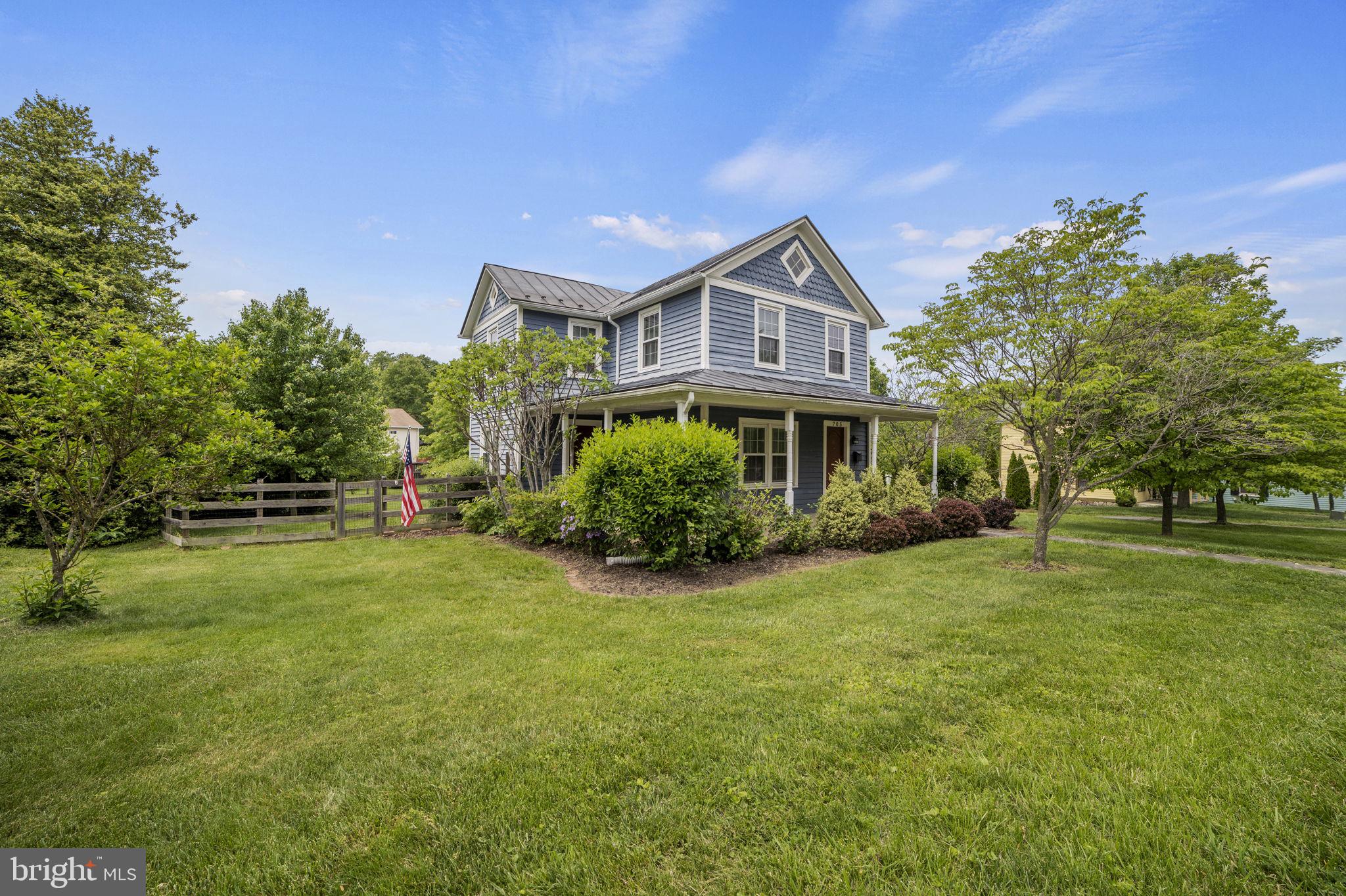705 Dranesville Road Herndon, VA 20170 - Photo 2 of 22 Charming home amidst lush greenery.