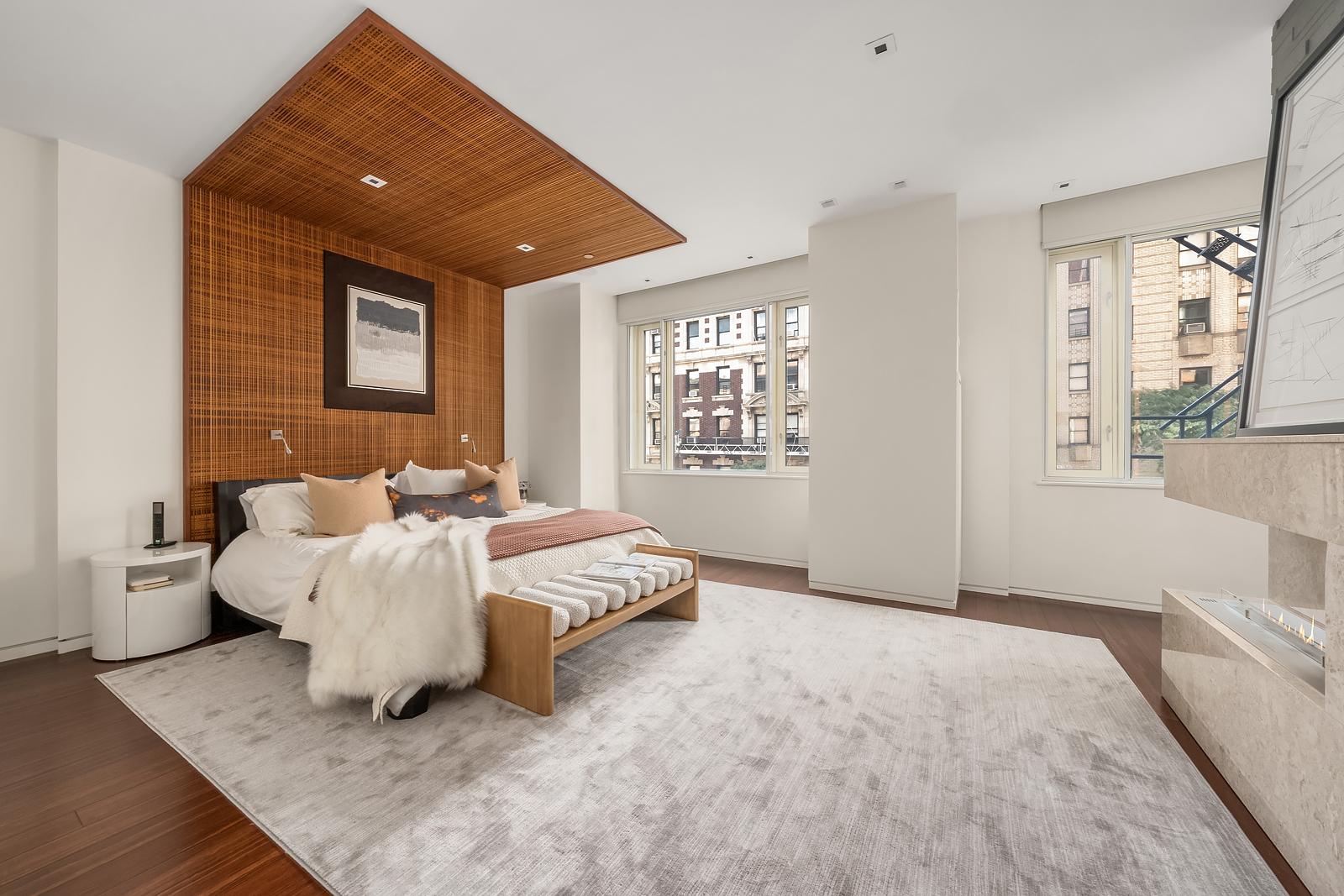 21 East 96th Street, Unit 3/4 Manhattan, NY 10128 - Photo 10 of 25 a bedroom with bed and window