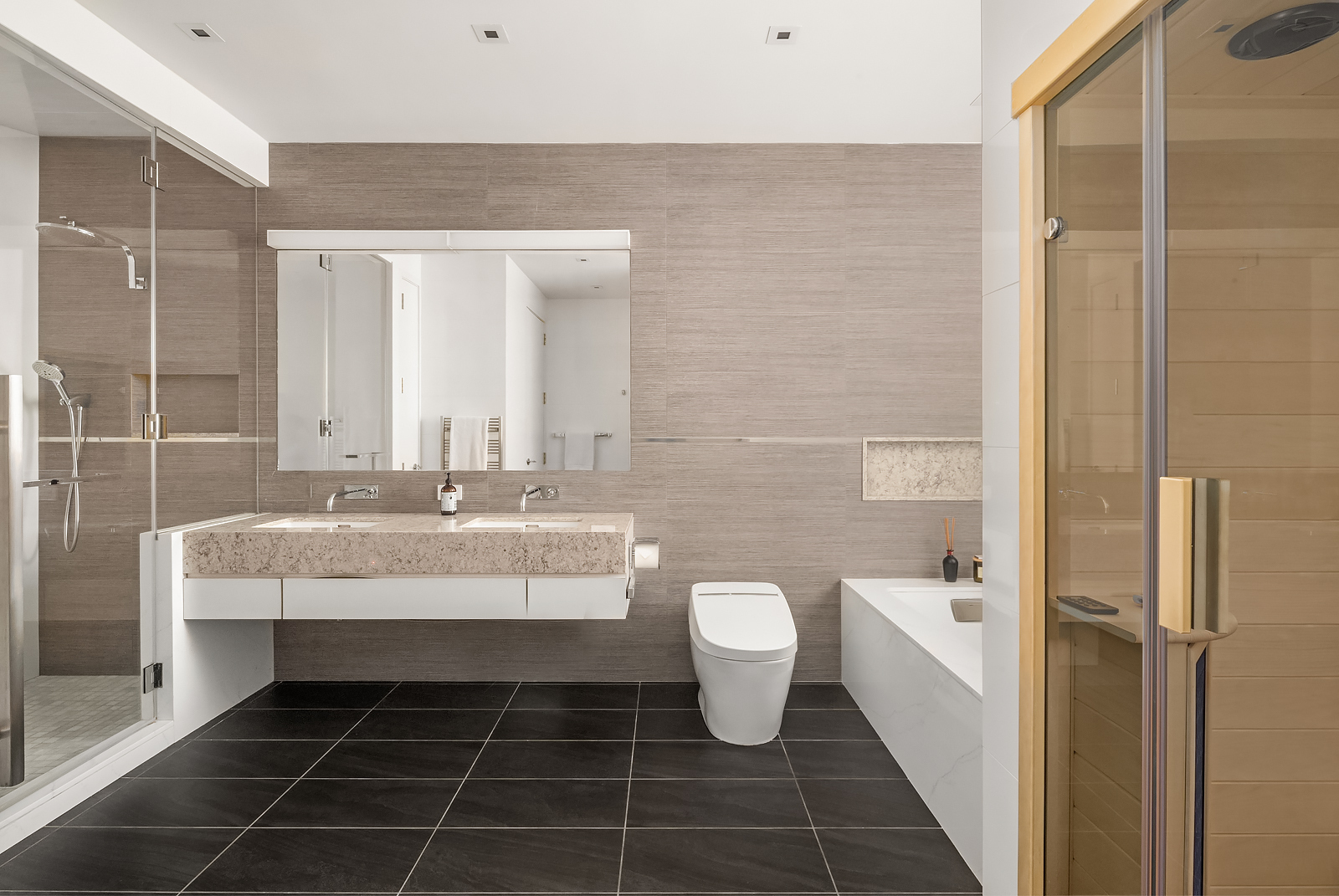 21 East 96th Street, Unit 3/4 Manhattan, NY 10128 - Photo 12 of 25 a bathroom with a double vanity sink mirror and toilet