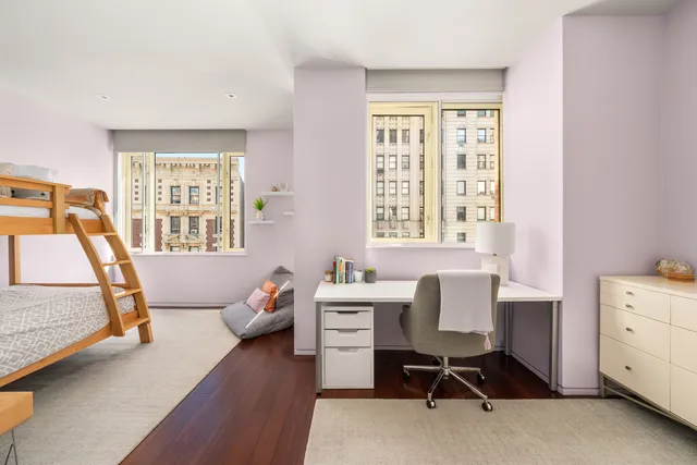 a room with furniture and a window