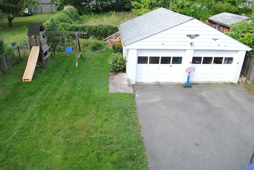 17 Kosciusko Street Springfield, MA 01151 - Photo 4 of 4 an aerial view of a house with a yard