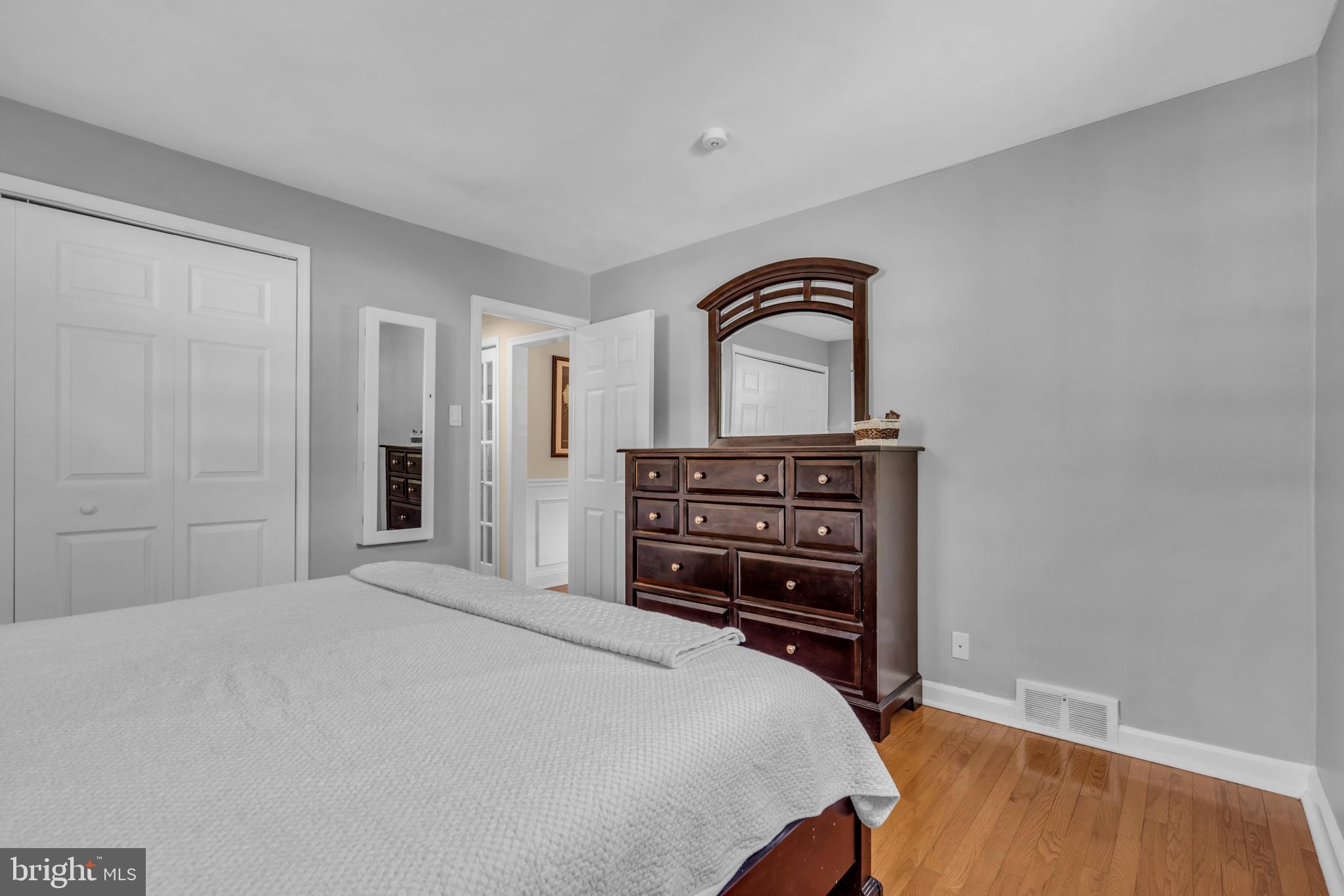 342 Garden Road Springfield, PA 19064 - Photo 17 of 41 a bedroom with a bed and a piano
