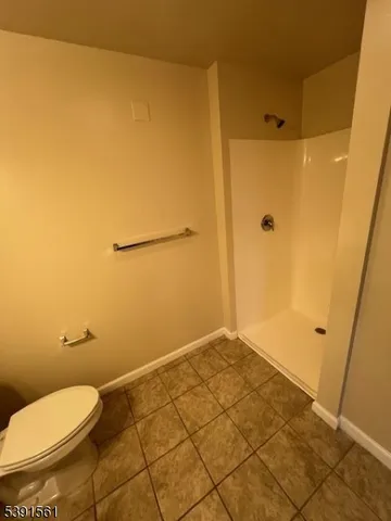 a bathroom with a toilet