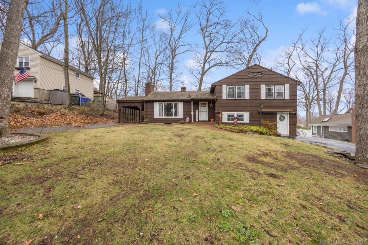 47 Forest Drive Wethersfield, CT 06109 - Photo 1 of 1 a view of a big yard with large tree