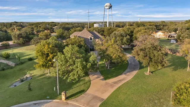 a view of a yard with an outdoor space