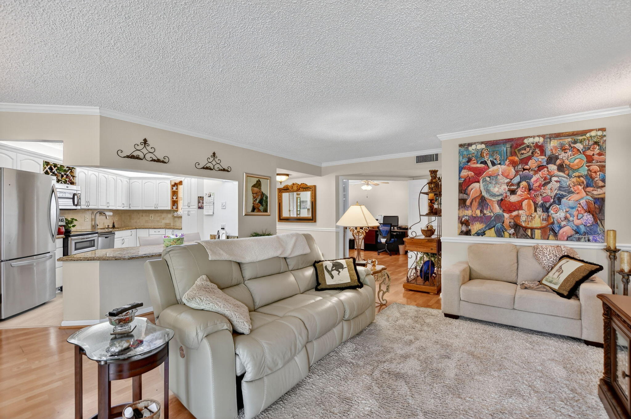 5650 Camino Del Sol, Unit 200 Boca Raton, FL 33433 - Photo 6 of 38 a living room with furniture and a couch