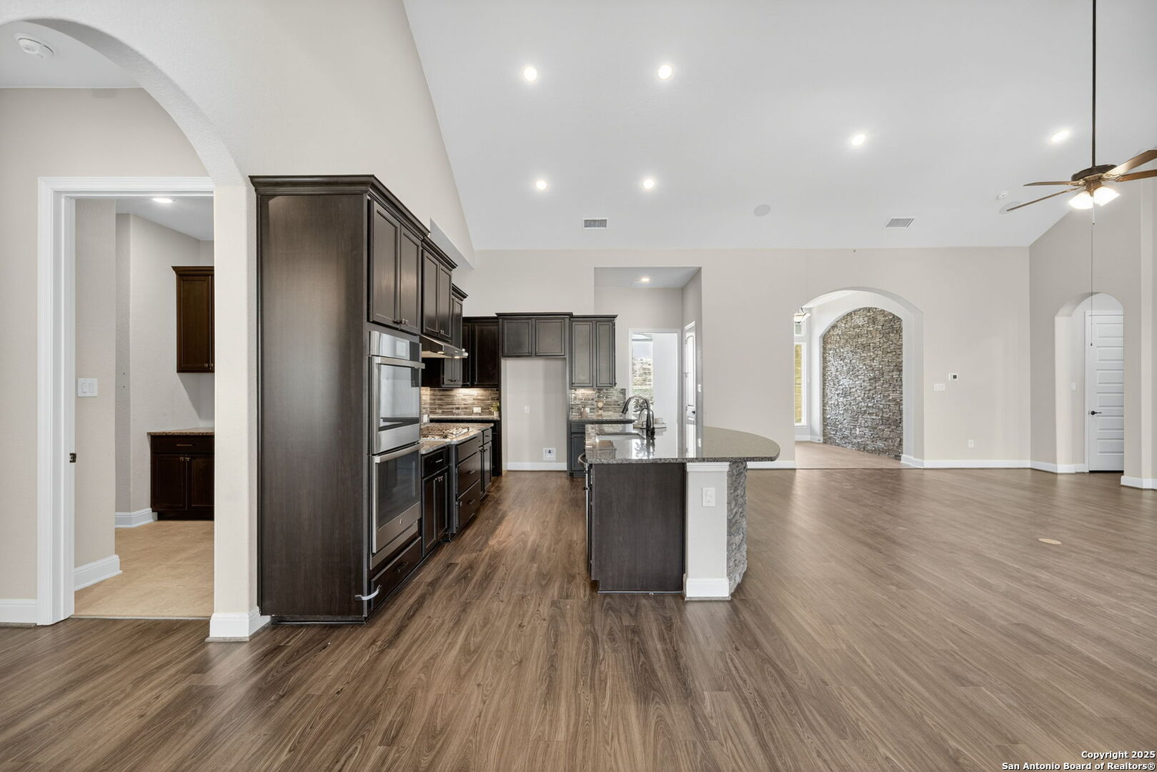 8283 Apache Forest Garden Ridge, TX 78266 - Photo 11 of 42 a view of kitchen with sink refrigerator and stove