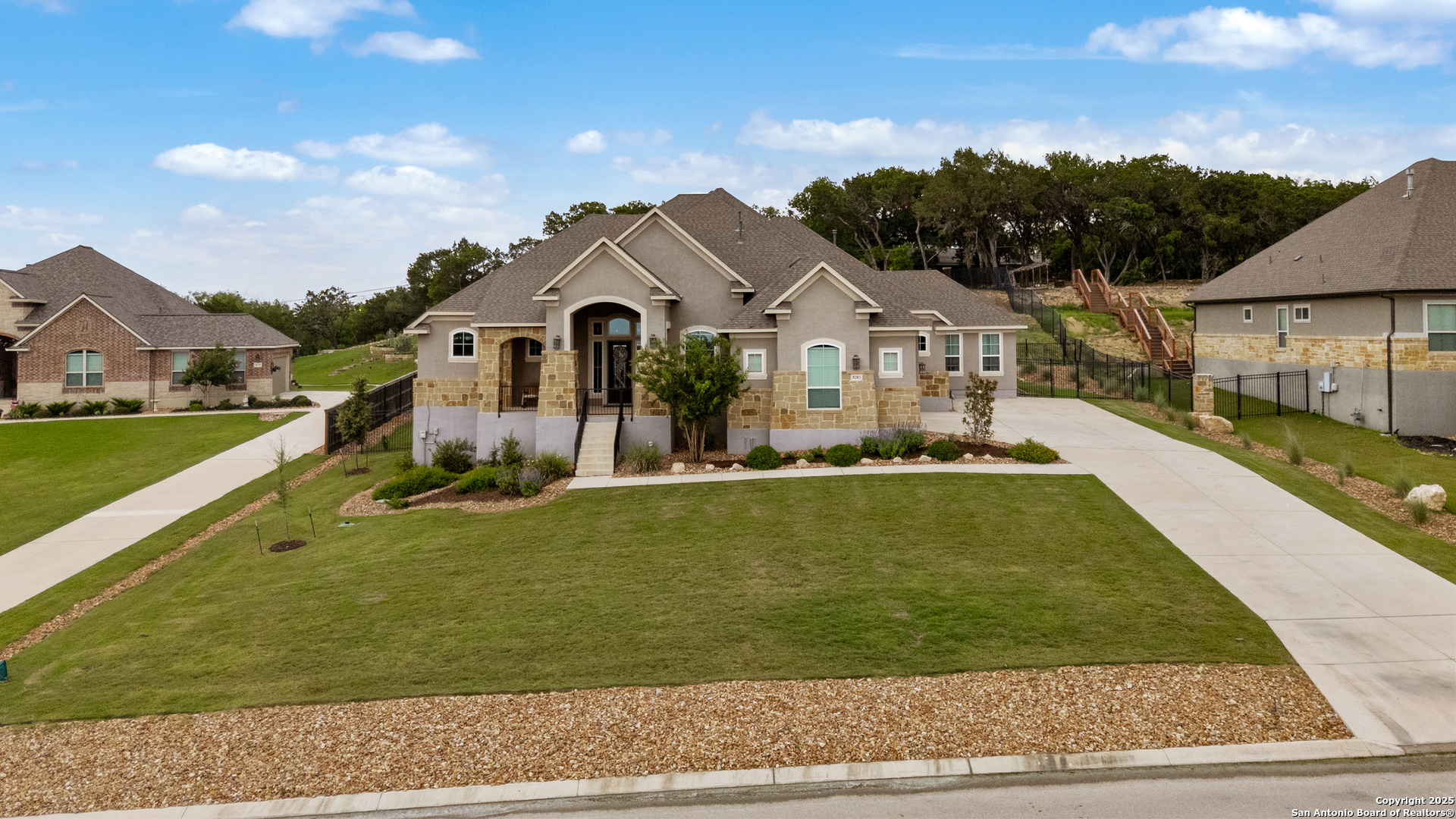 8283 Apache Forest Garden Ridge, TX 78266 - Photo 2 of 42 a front view of a house with a yard