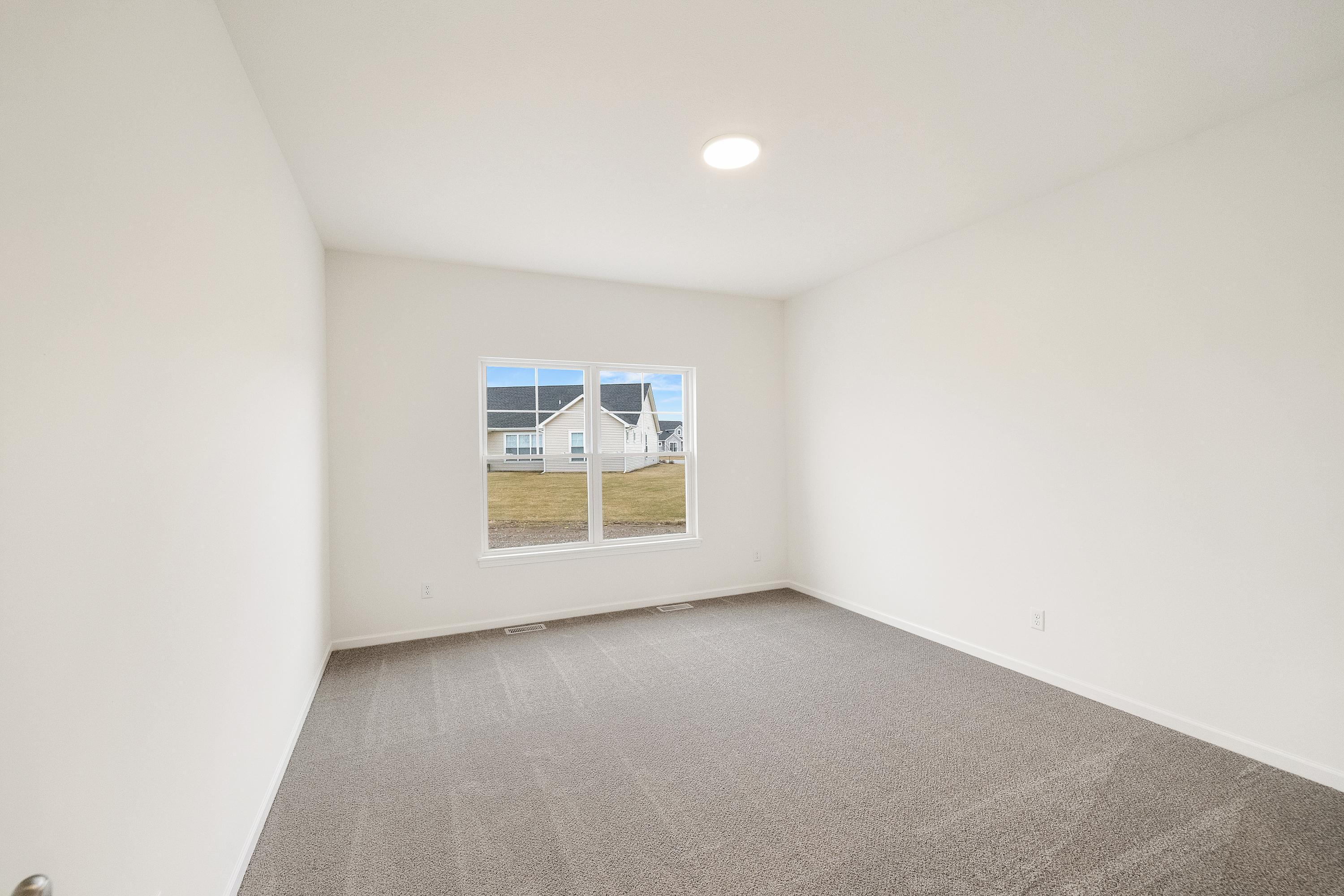 5264 Red Rock Lane Schererville, IN 46375 - Photo 11 of 21 an empty room with a window