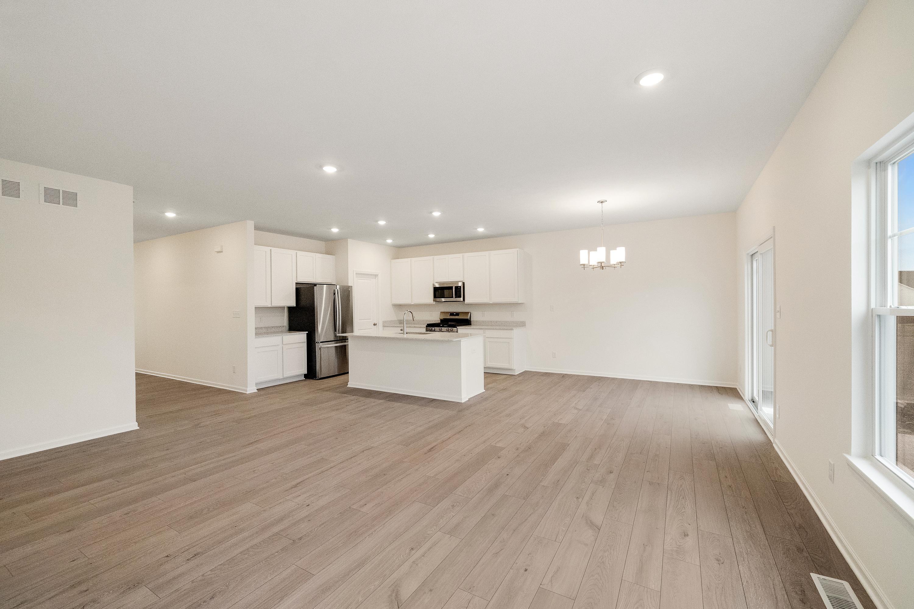 5264 Red Rock Lane Schererville, IN 46375 - Photo 7 of 21 a view of kitchen with wooden floor
