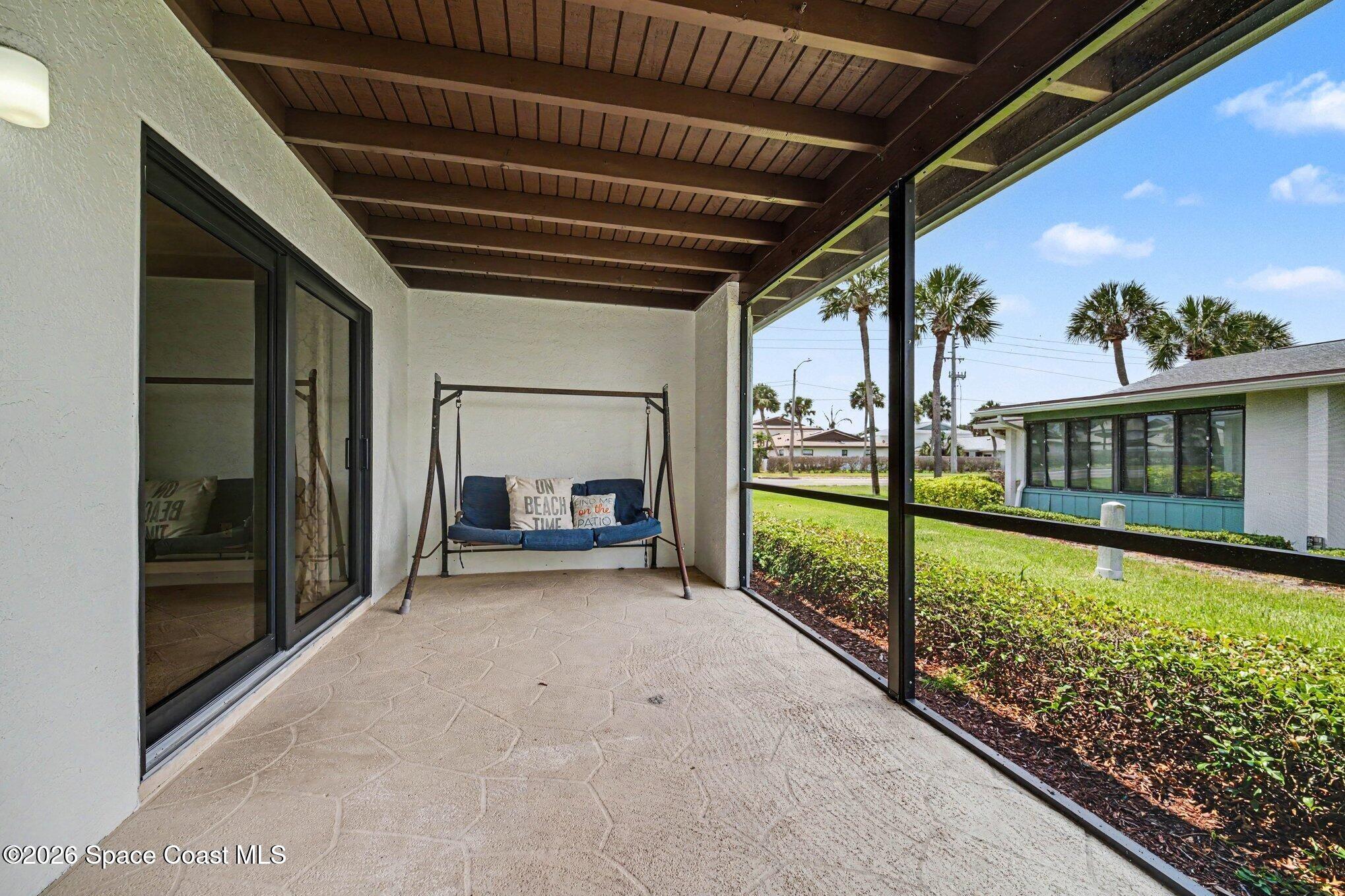 290 Paradise Boulevard, Unit 2 Indialantic, FL 32903 - Photo 15 of 20 Screened patio