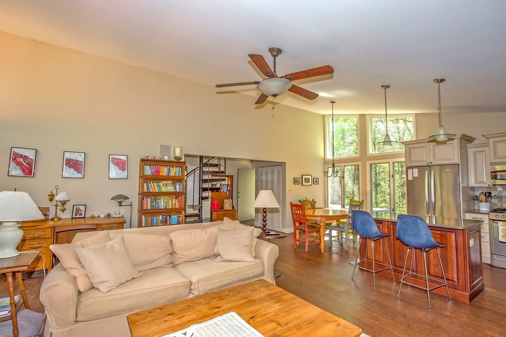 265 Fox Den Road Tolland, MA 01034 - Photo 19 of 37 a living room with furniture and a large window