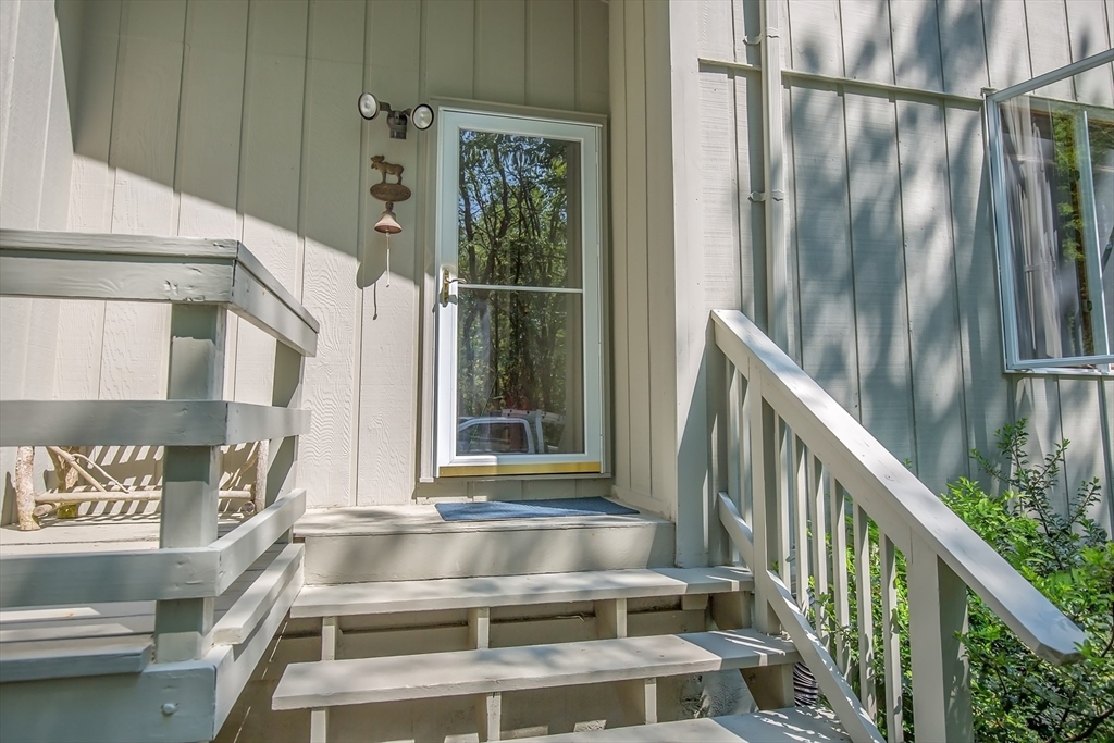265 Fox Den Road Tolland, MA 01034 - Photo 4 of 37 a view of entryway and hall with wooden floor