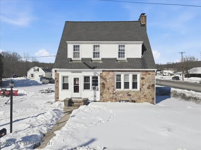 a kitchen with a sink cabinets and a window