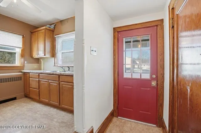a living room with furniture fireplace and flat screen tv