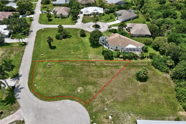 an aerial view of residential house with outdoor space
