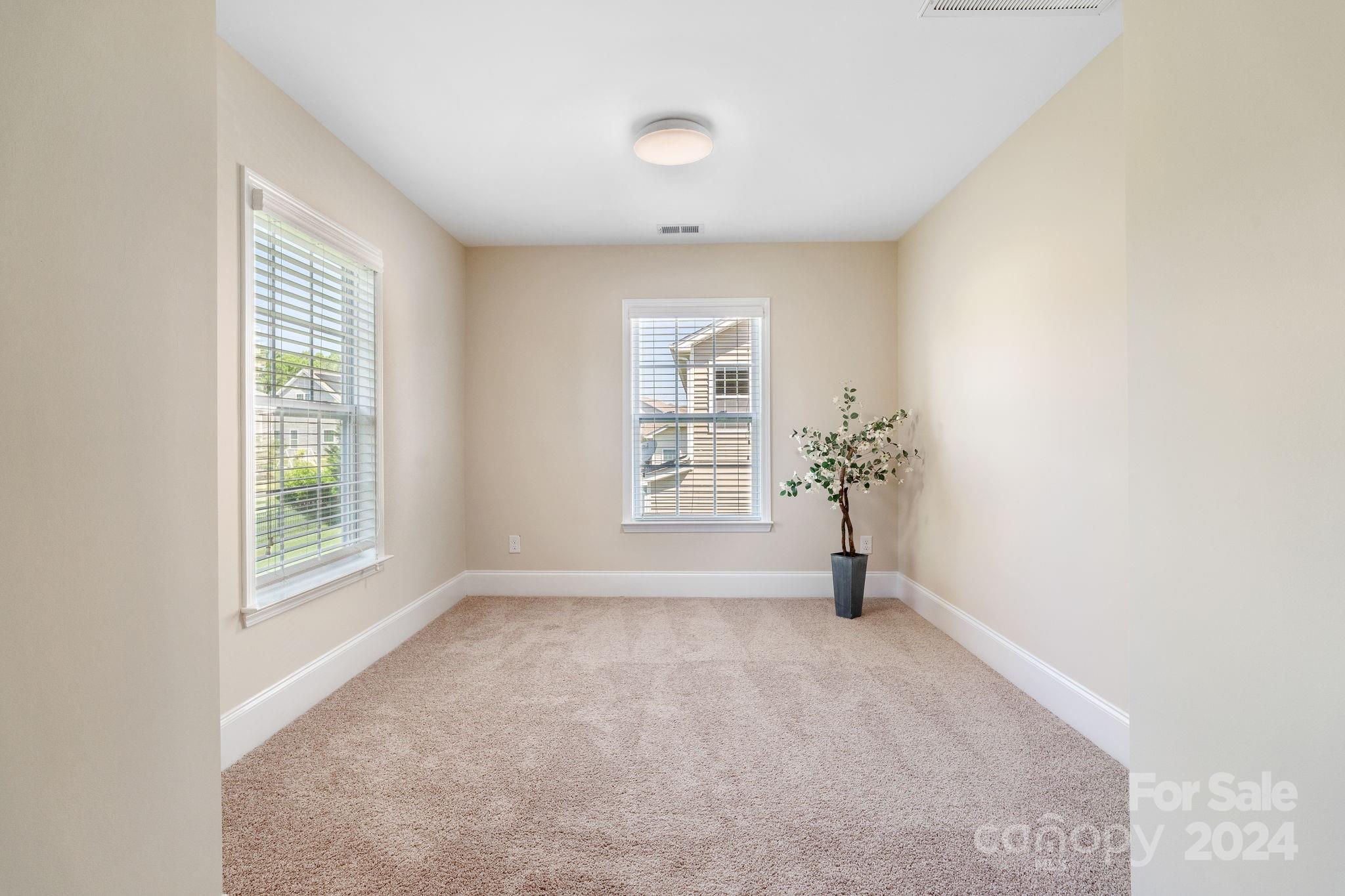 580 Rosemary Lane Fort Mill, SC 29708 - Photo 14 of 37 a view of an empty room with a window