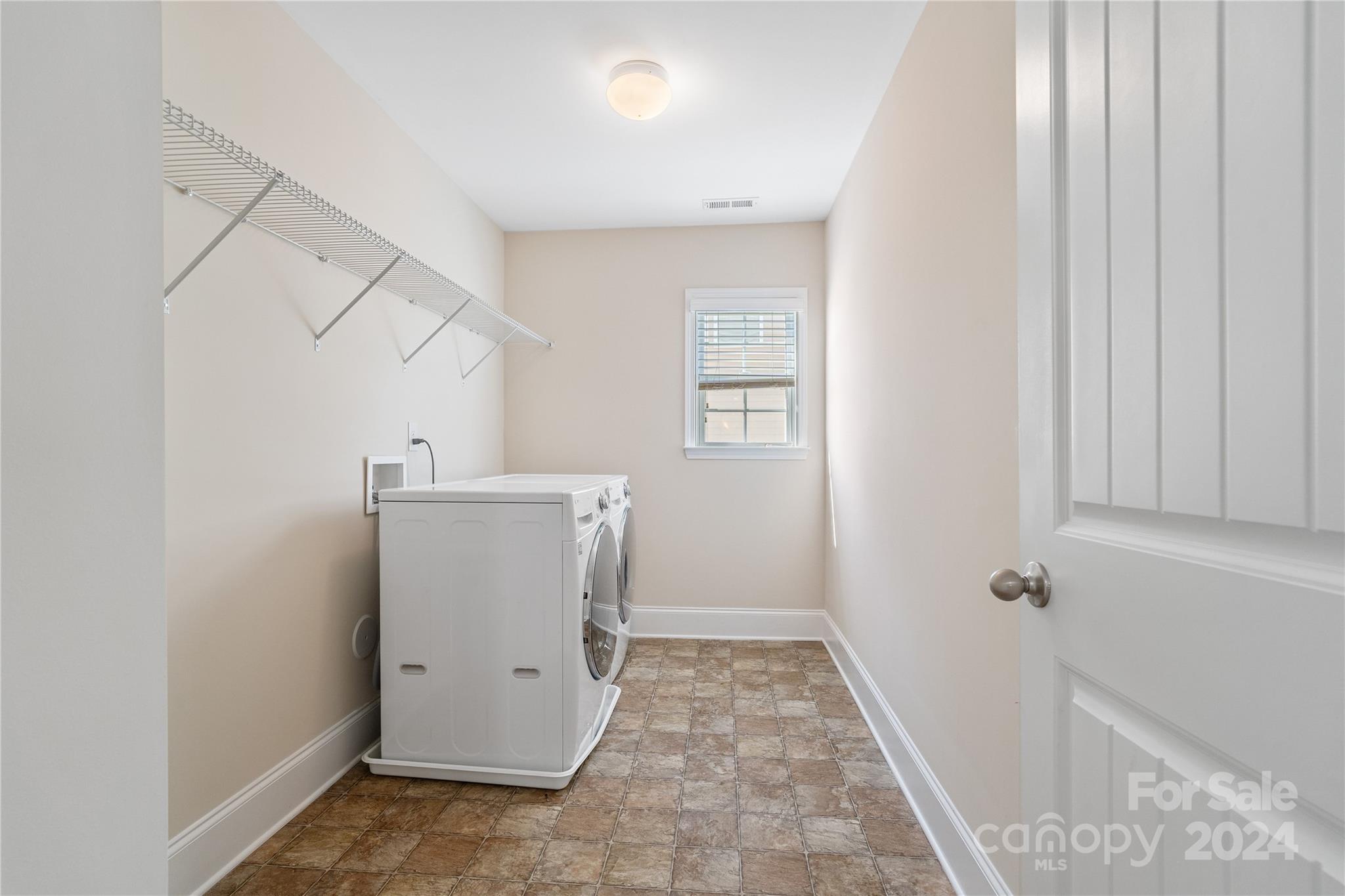 580 Rosemary Lane Fort Mill, SC 29708 - Photo 18 of 37 a view of a storage & utility room with a window