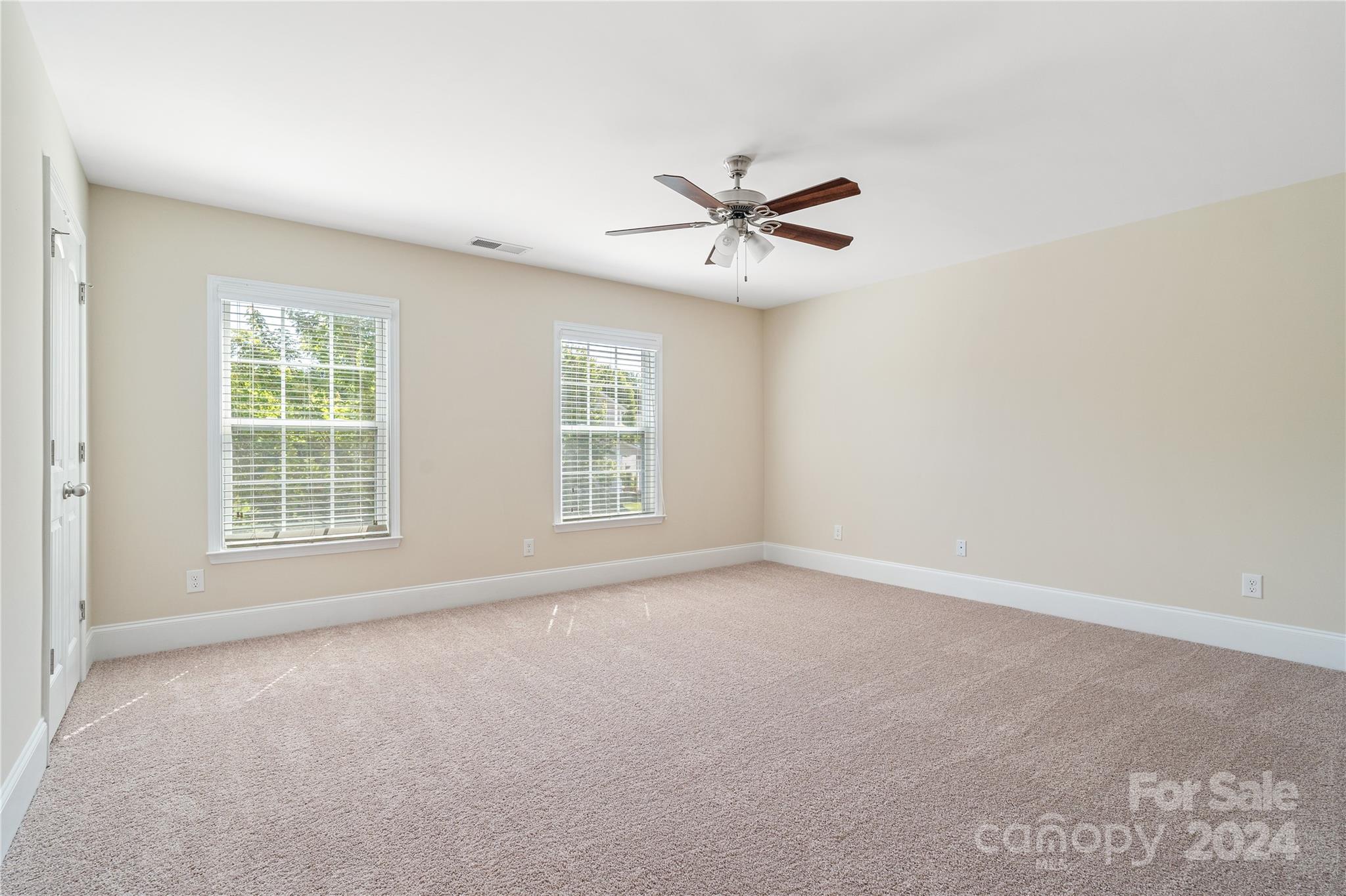 580 Rosemary Lane Fort Mill, SC 29708 - Photo 19 of 37 a view of an empty room with a window