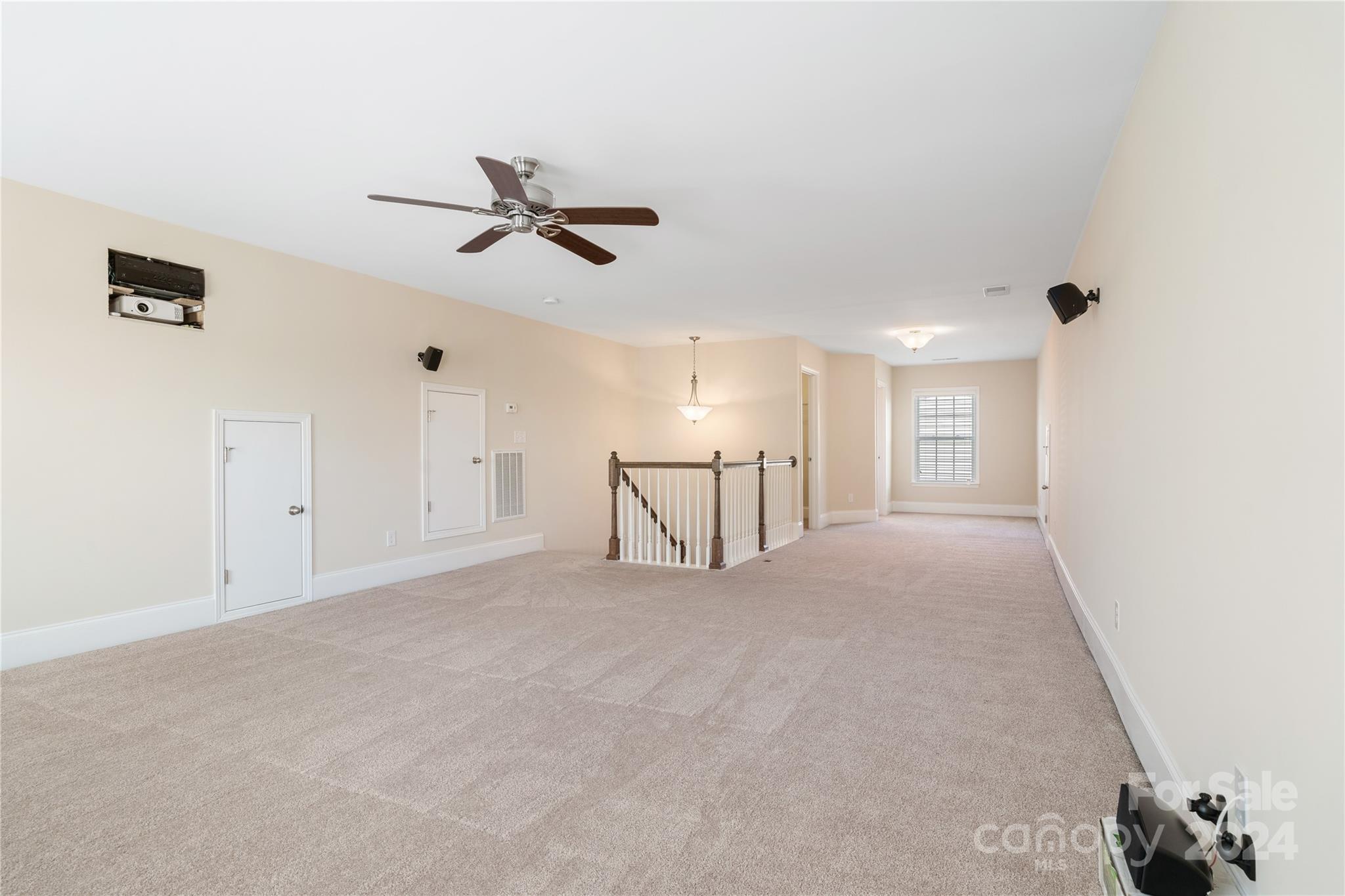580 Rosemary Lane Fort Mill, SC 29708 - Photo 24 of 37 a view of a livingroom with a ceiling fan and window
