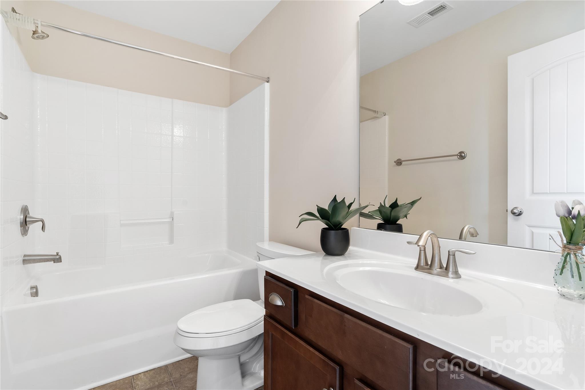 580 Rosemary Lane Fort Mill, SC 29708 - Photo 26 of 37 a bathroom with a sink a toilet and shower