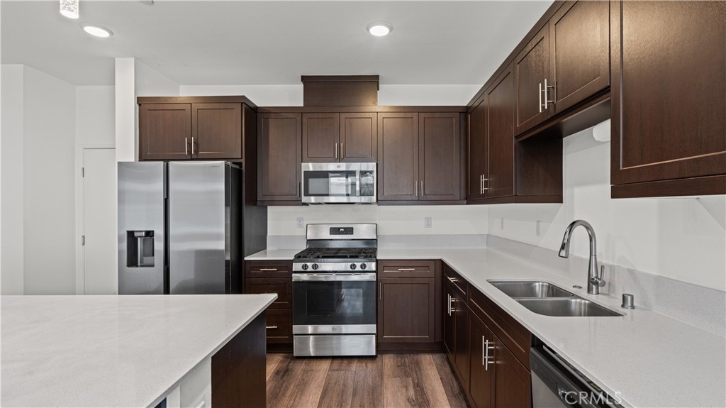 35172 Grove Trail Fallbrook, CA 92028 - Photo 1 of 30 a kitchen with stainless steel appliances granite countertop a sink stove and refrigerator
