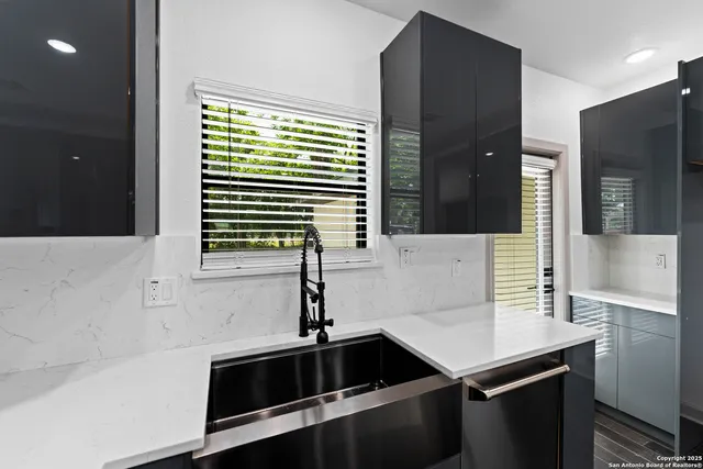 a bathroom with a sink and a bathtub