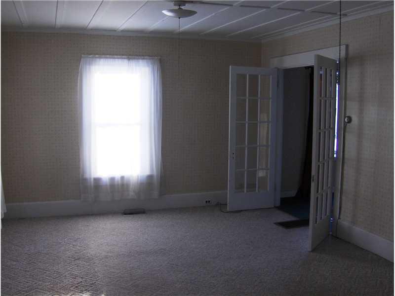 70 Pleasant Street Milo, ME 04463 - Photo 5 of 10 Living Room.